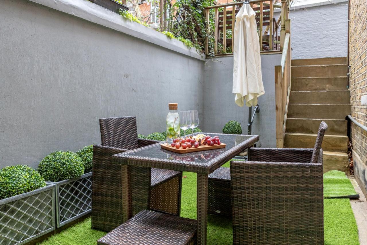 Elegant Kensington Apartment With Patio Londra Esterno foto